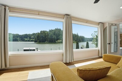 Tranquil Siltcoos Lakefront Gem w/ Luxurious Master Suite with View, Dock, EV Charger