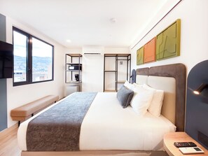 Deluxe Suite | In-room safe, desk, blackout drapes, iron/ironing board (on request)