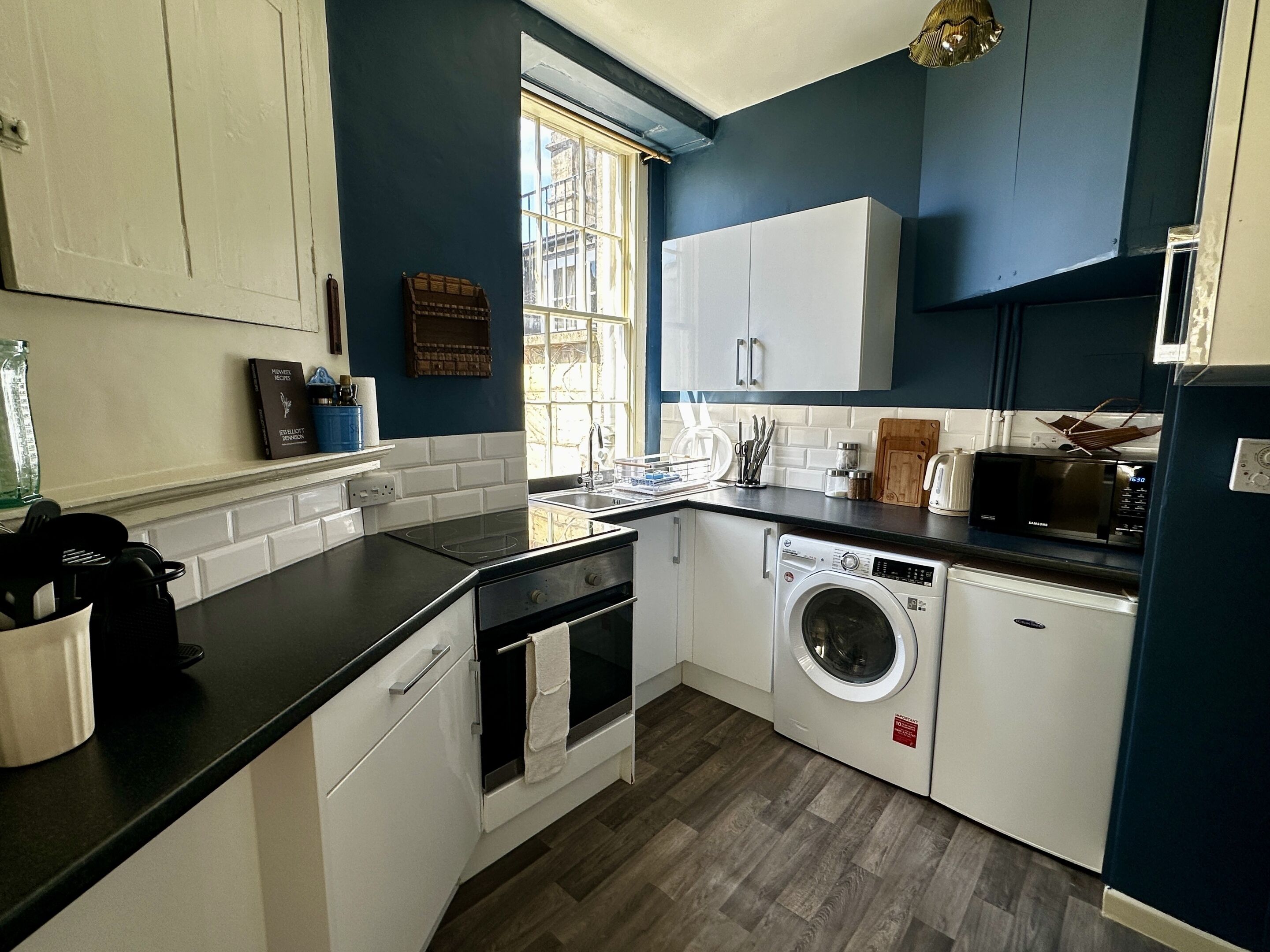 Coffee/tea maker, fridge, microwave, oven