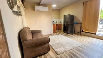 Family Apartment, Pool View | Living area
