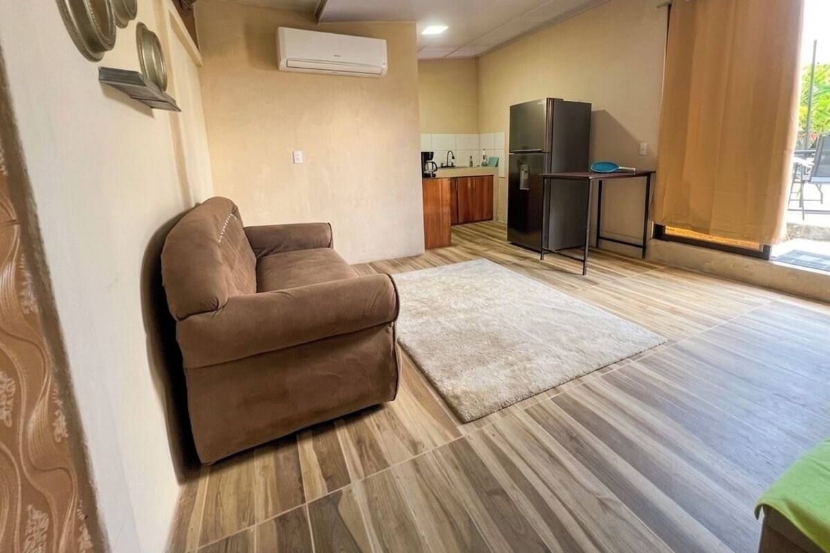 Family Apartment, Pool View | Living area
