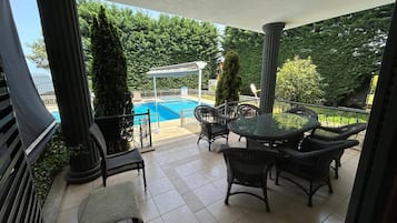 Luxury Villa, Pool View | Outdoor dining