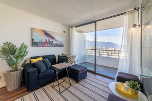 Familienapartment, Balkon, Stadtblick | Wohnbereich
