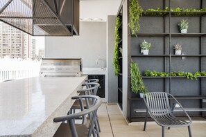 Familienapartment, Balkon | Speisen im Freien