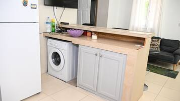 Appartement, 2 chambres, patio | Blanchisserie