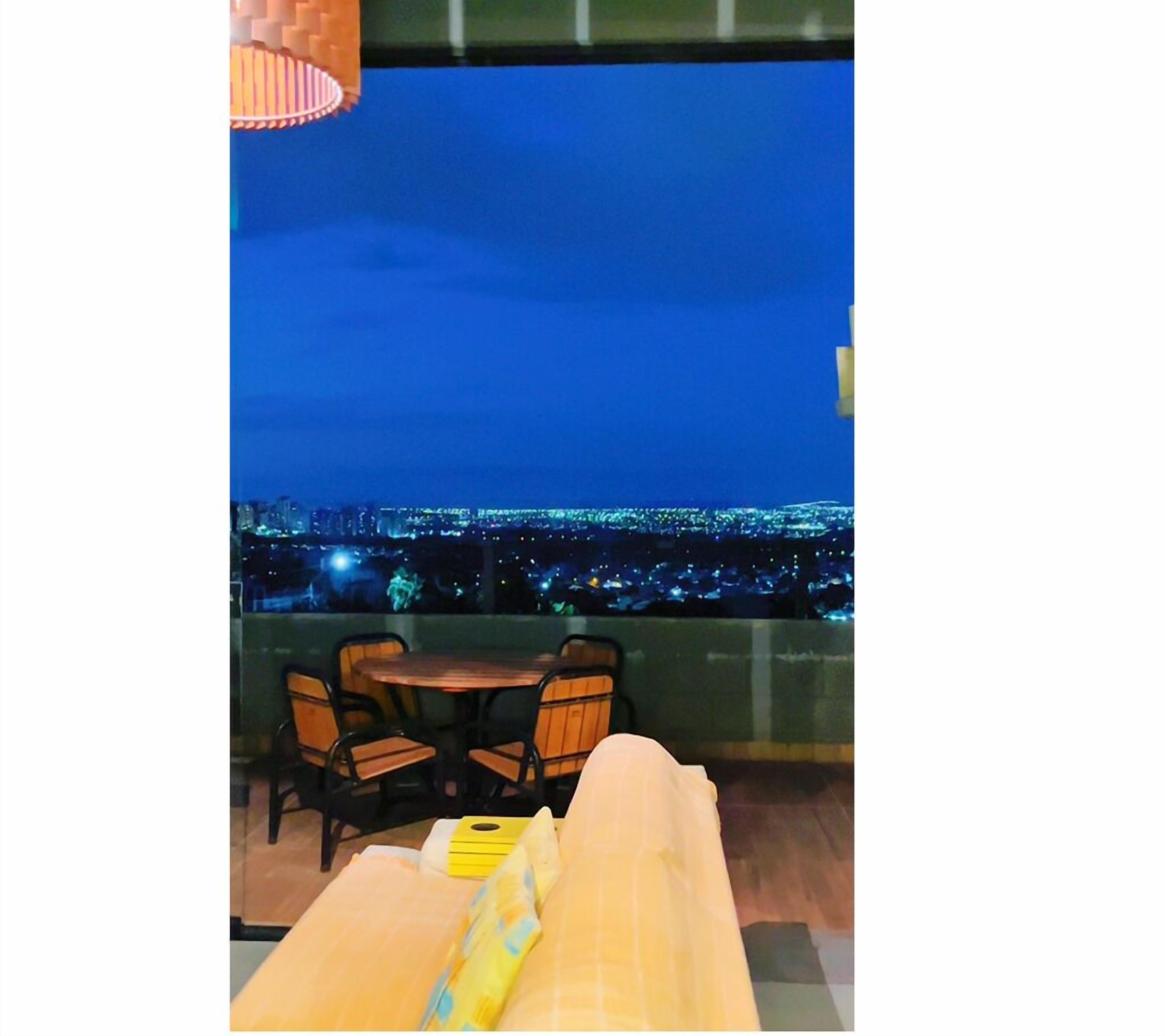 Apartamento conforto, vista para a cidade | Terraço/pátio
