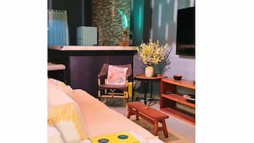 Apartamento conforto, vista para a cidade | Área de estar