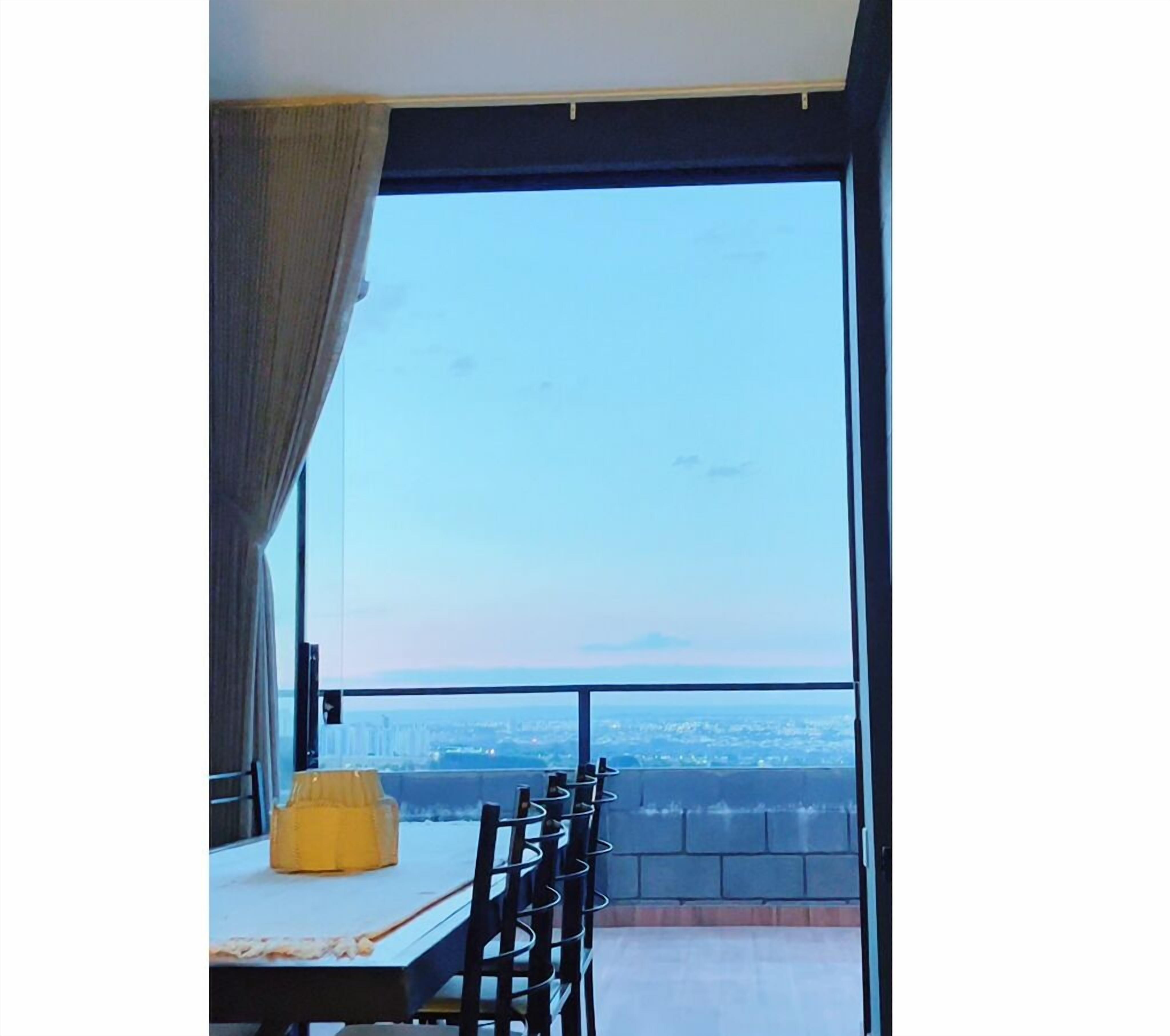 Departamento Confort, vista a la ciudad | Restaurantes