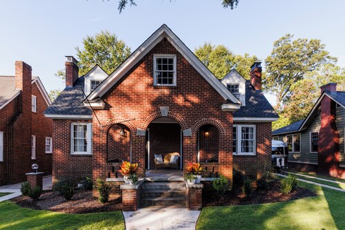 Historic fully renovated bungalow duplex with a grill and fire pit in the backyard, ample parking, and steps from coffee shops and restaurants.