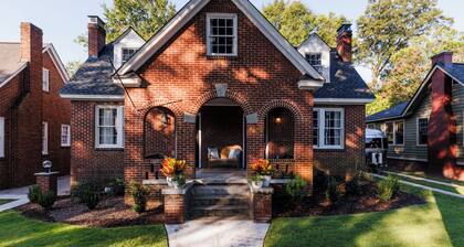 Historic fully renovated bungalow duplex with a grill and fire pit in the backyard, ample parking, and steps from coffee shops and restaurants.