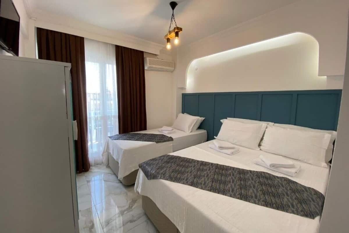 Chambre triple Standard, balcon | Accès au Wi-Fi (inclus)