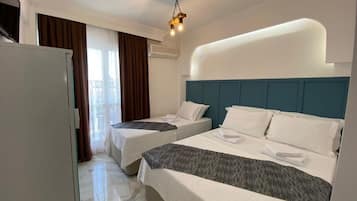 Standard Triple Room, Balcony | Free WiFi
