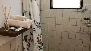 Shower, hair dryer, towels, soap