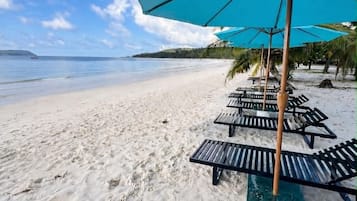On the beach, white sand