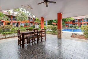 Outdoor dining - Beachy 2BR Condo with Pool • Walk to Coco Beach (Playa del Coco)