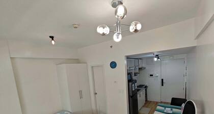 Enjoy a cozy and minimalist unit in the heart of Southwoods, Biñan.