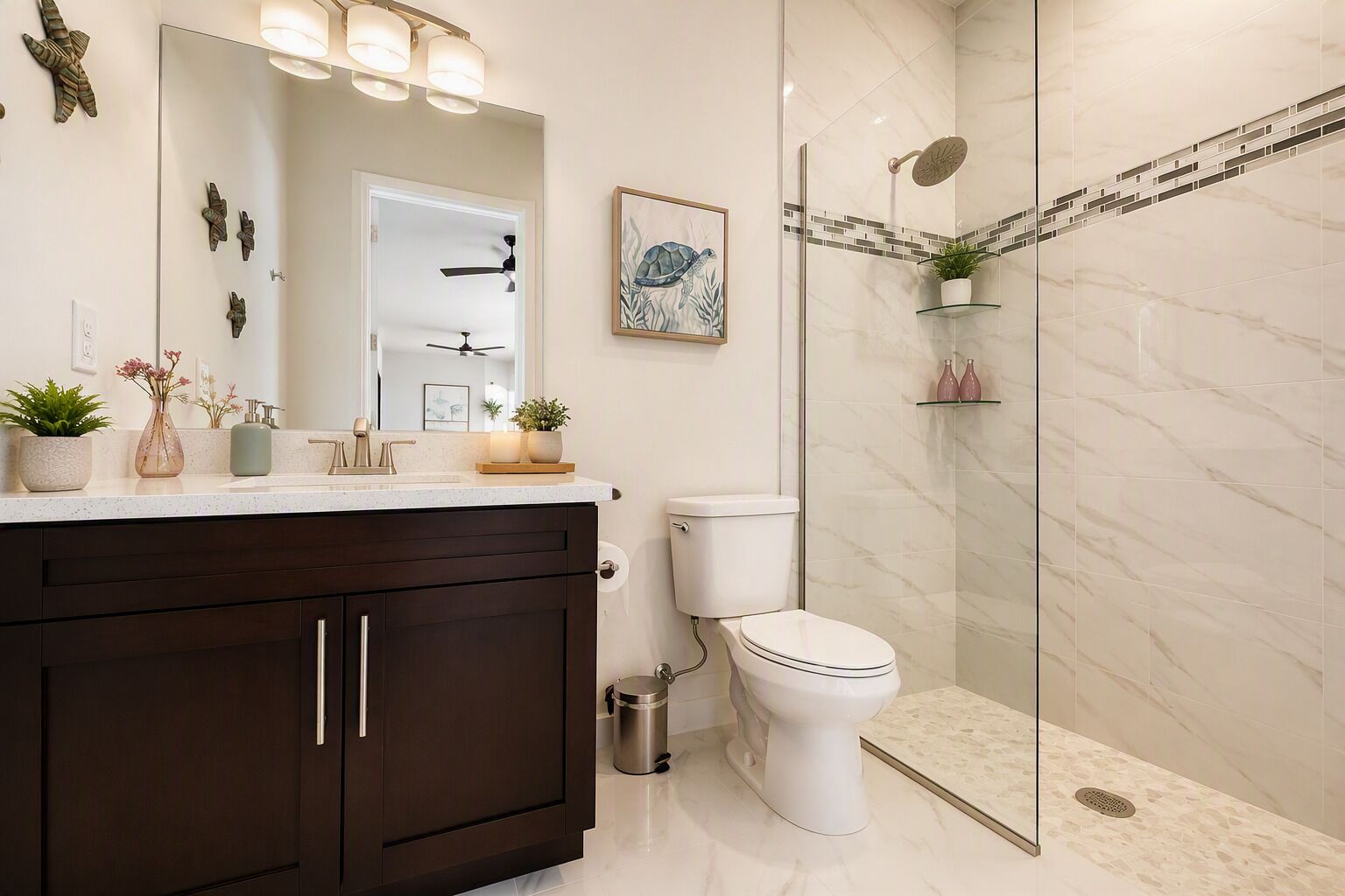 A modern bathroom with a glass shower enclosure, a toilet, and a vanity with a mirror.