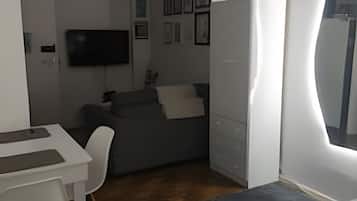 Apartamento básico | Wi-Fi de cortesia, roupa de cama
