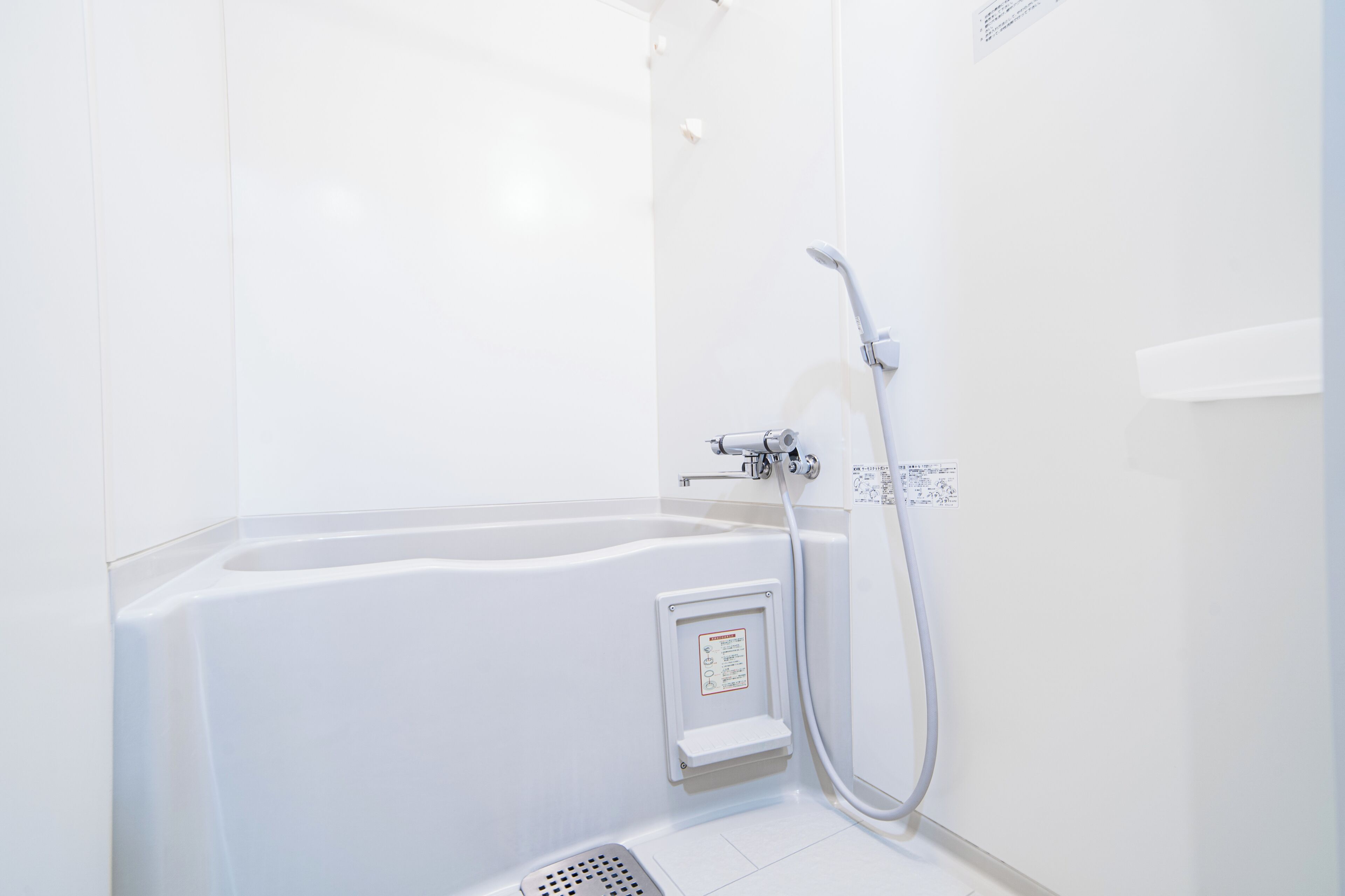 Separate tub and shower, hair dryer, electronic bidet, towels