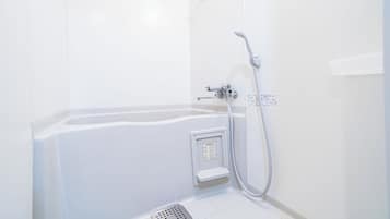 Separate tub and shower, hair dryer, electronic bidet, towels
