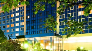 A modern building with a sign reading 'RAITIC' at the top. - Baltic Zinnowitz (Zinnowitz)