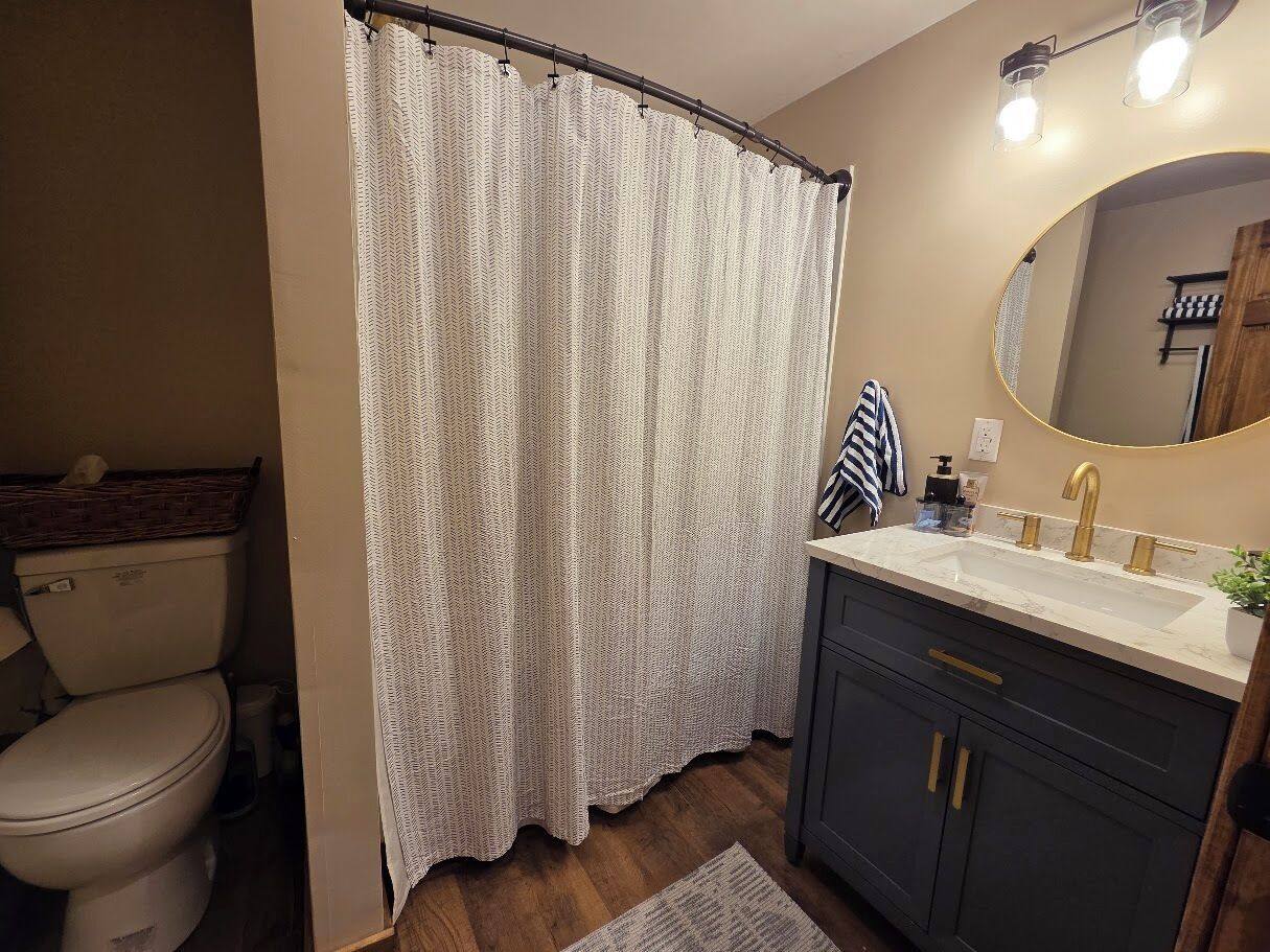 Shower, towels, soap, toilet paper