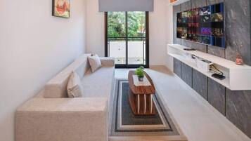 Departamento, vista a la ciudad | Área de sala de estar