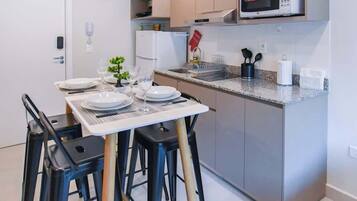 Departamento, vista a la ciudad | Cocina privada
