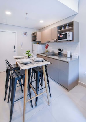 Departamento, vista a la ciudad | Cocina privada