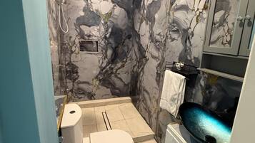Hair dryer, bidet, towels, soap
