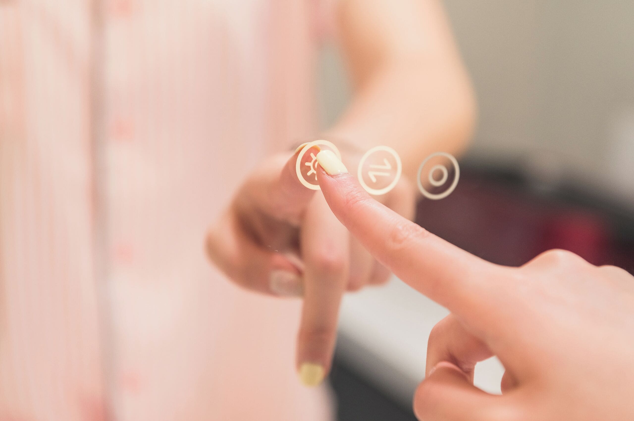 A close-up of a hand interacting with a touchscreen interface.