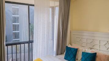 Classic Apartment, Balcony, City View | Desk, laptop workspace, iron/ironing board, free WiFi