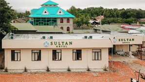 A building with a sign reading 'SULTAN HOTEL'. - Sultan Kyzyl-Kiya (Kyzyl-Kiya)
