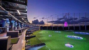 A stadium with multiple seating tiers, a green field, and a large illuminated structure. - Villa Vivara, Luxury 7BR Retreat with Private Pool in Miami (North Miami Beach)