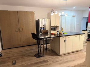 Coffee/tea maker, fridge, microwave, oven