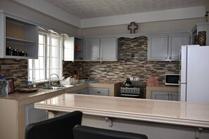 Private kitchen - Spacious 2BR Apartment in Cap Estate, Saint Lucia - Walk to Beaches (Cap Estate, Gros Islet)