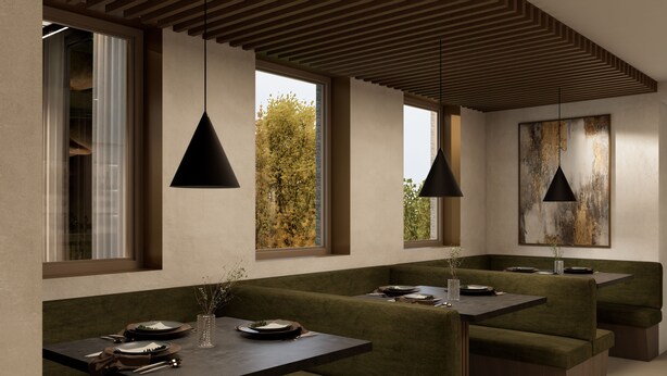 A modern dining area with green upholstered seating, pendant lighting, and large windows offering views of trees.