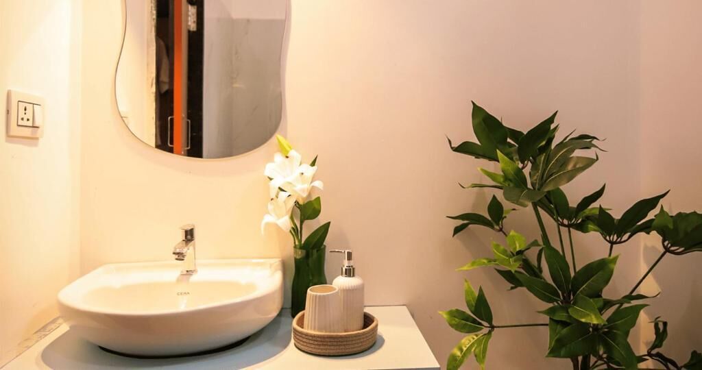 Shower, hair dryer, slippers, towels