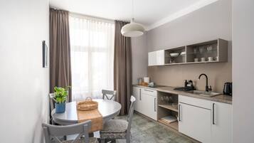 Fridge, microwave, stovetop, coffee/tea maker