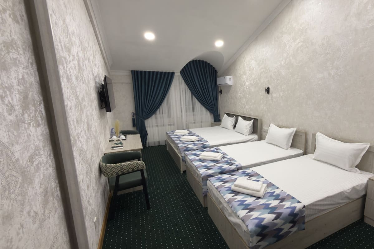 Family Quadruple Room | In-room safe, desk, laptop workspace, iron/ironing board (on request)