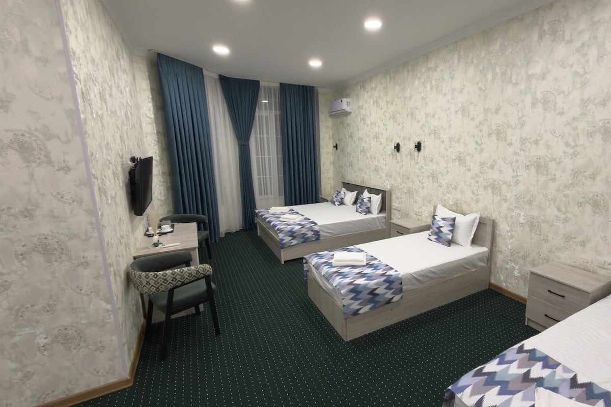 Standard Triple Room | In-room safe, desk, laptop workspace, iron/ironing board (on request)
