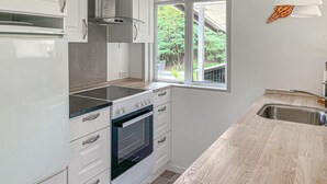 Coffee/tea maker, fridge, stovetop, dishwasher