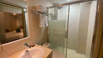 Deluxe Double Room, City View | Bathroom | Shower, hair dryer, towels, soap