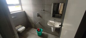 Premium Double Room | Bathroom | Free toiletries, towels, soap, shampoo - PLA Nest -Comfort Stay  (Thanjavur)