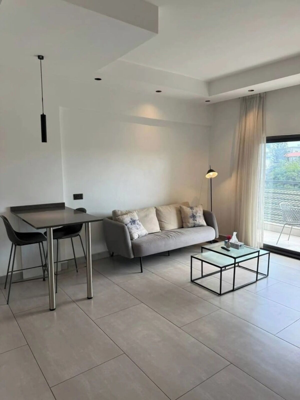 Deluxe Apartment, City View | Living area | 43-inch flat-screen TV with cable channels