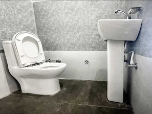 Ducha, artículos de tocador gratuitos, jabón
