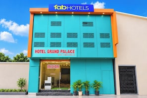 A hotel facade with a prominent sign reading 'fabHOTELS HOTEL GRAND PALACE' and a visible entrance. - FabHotel Grand Palace (Mumbai)