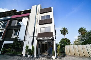 A modern hotel building with a sign reading 'HOTEL OCEAN.' - Fabhotel Ocean (Indore)