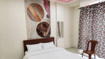 Habitación Deluxe | Sábanas de algodón egipcio, ropa de cama de alta calidad, caja fuerte
