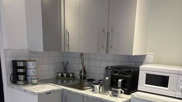Microwave, electric kettle, toaster